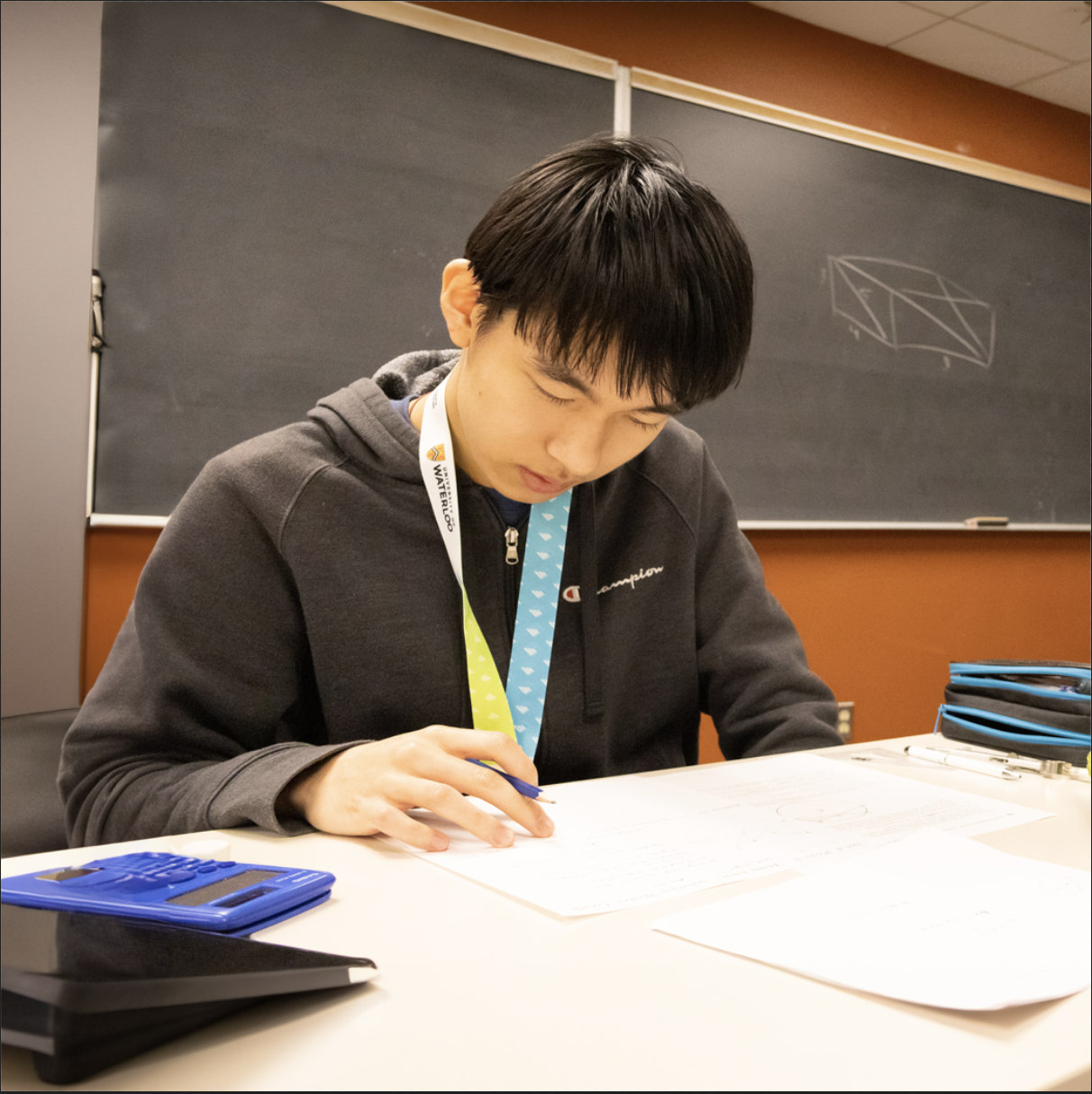 Student practicing mathematical problem solving in the classroom